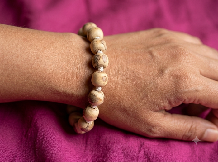 A traditional Tulsi Hand Bracelet featuring natural Tulsi beads, designed for comfortable everyday devotional wear.