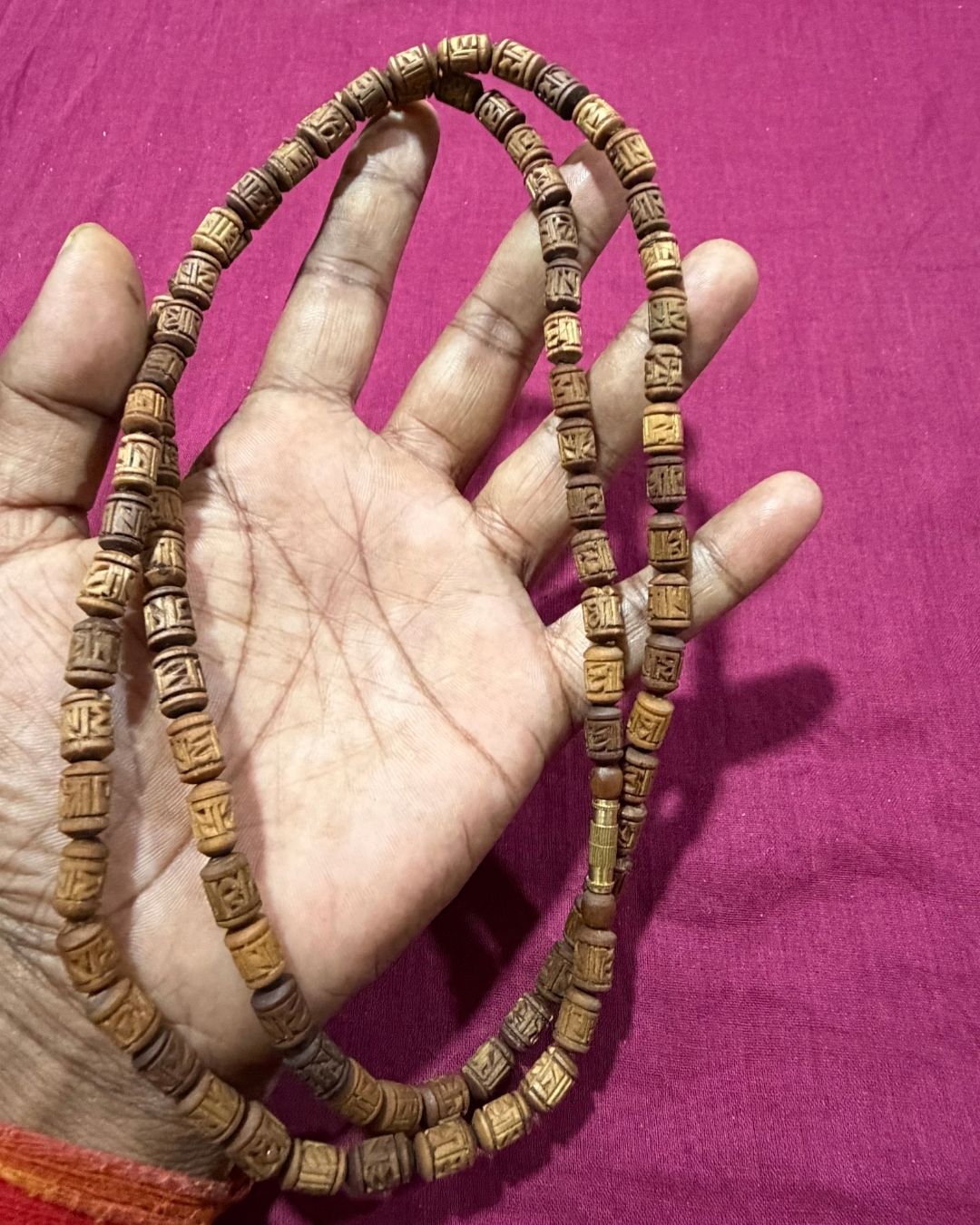 2 round brown radha name beads tulsi mala featuring Radha name beads in a traditional Tulsi design